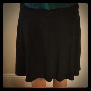 Black flowing knee length skirt
